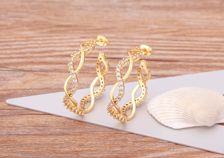ZIRCON CRYSTAL TWIST HOOPS