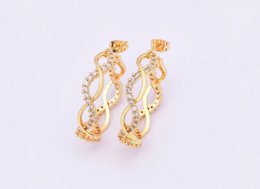 ZIRCON CRYSTAL TWIST HOOPS
