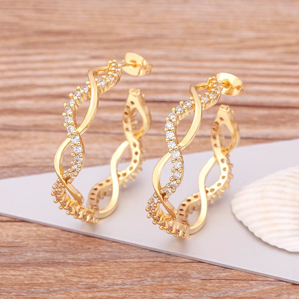 ZIRCON CRYSTAL TWIST HOOPS