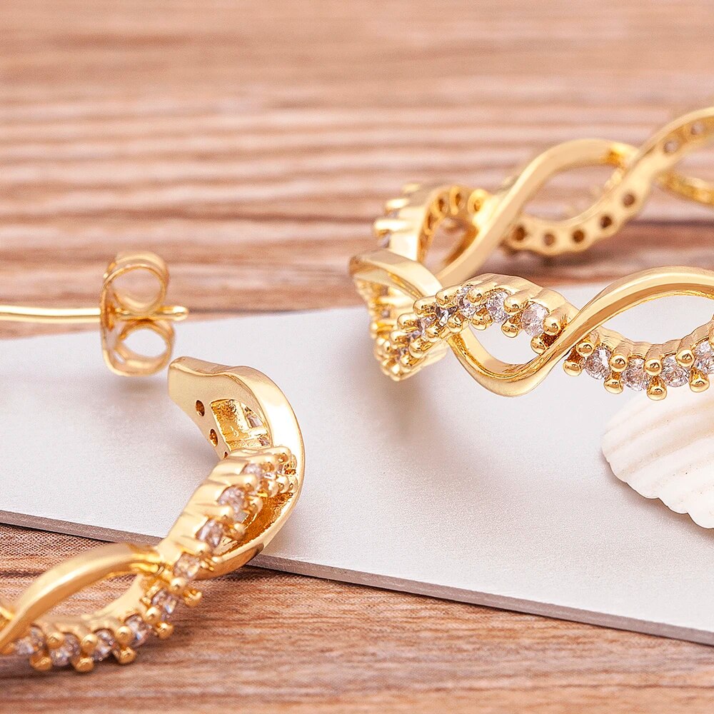ZIRCON CRYSTAL TWIST HOOPS