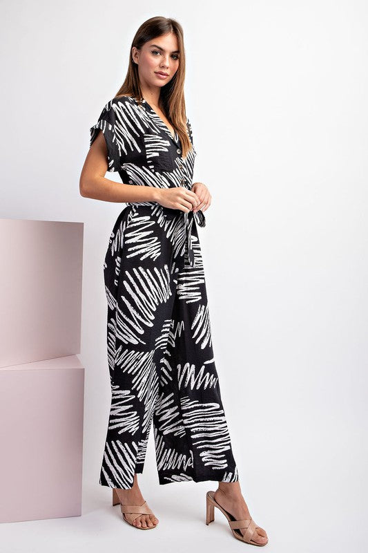 PRINTED JUMPSUIT WITH WAIST TIE