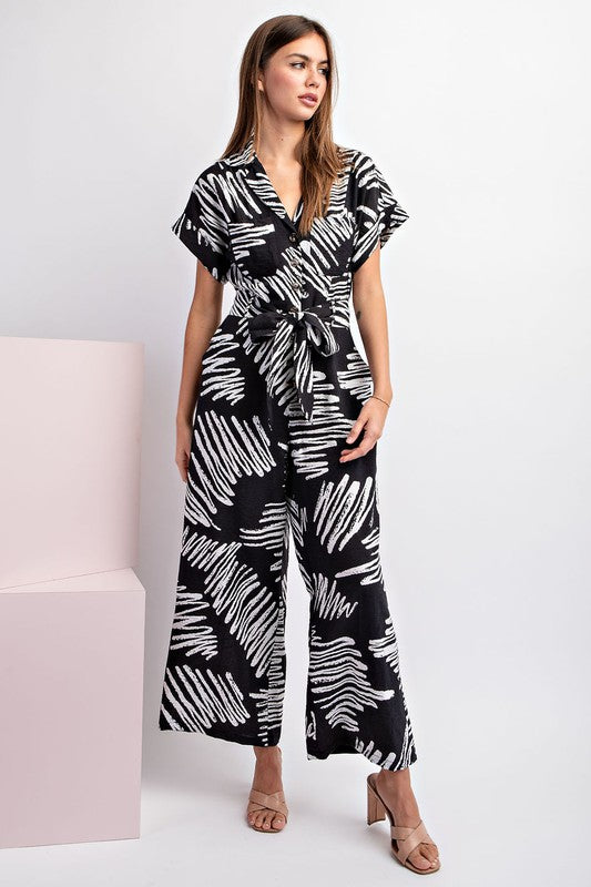 PRINTED JUMPSUIT WITH WAIST TIE