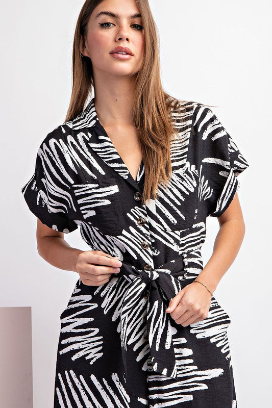 PRINTED JUMPSUIT WITH WAIST TIE