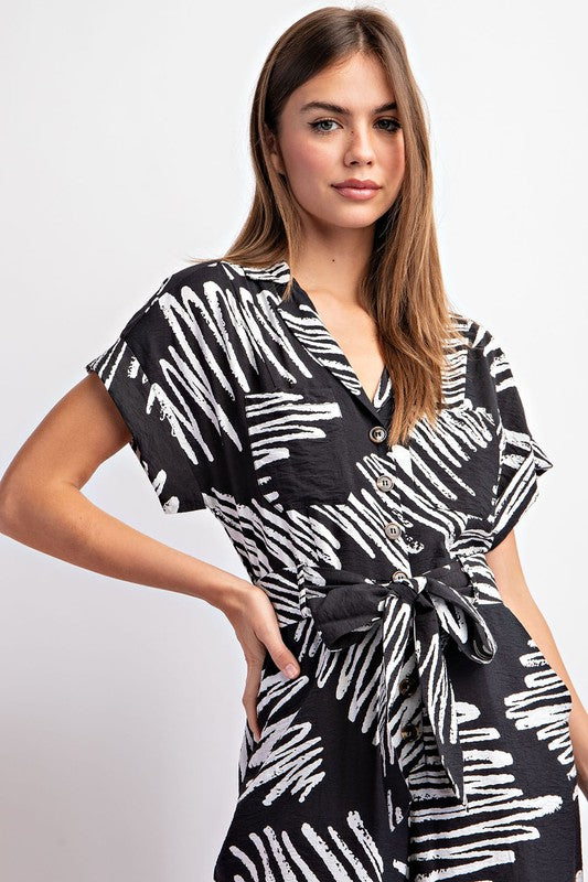 PRINTED JUMPSUIT WITH WAIST TIE