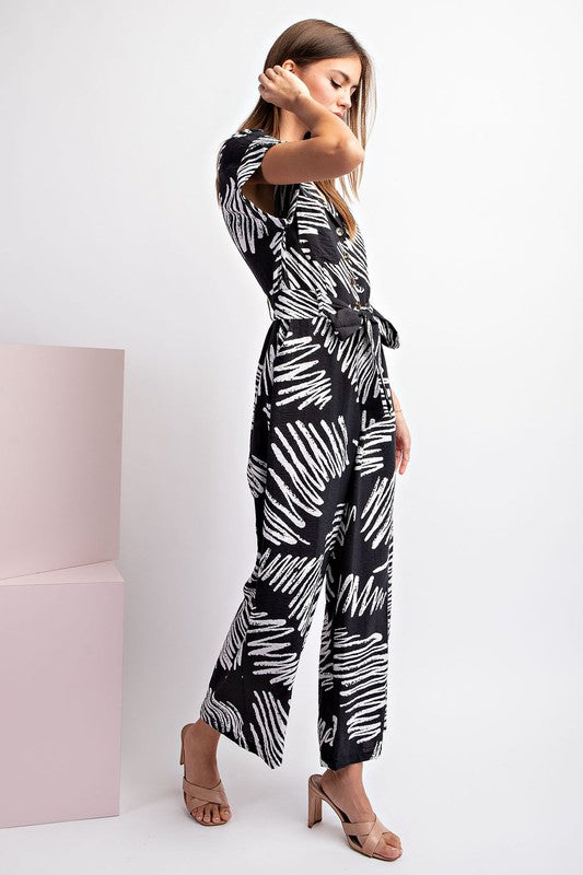 PRINTED JUMPSUIT WITH WAIST TIE