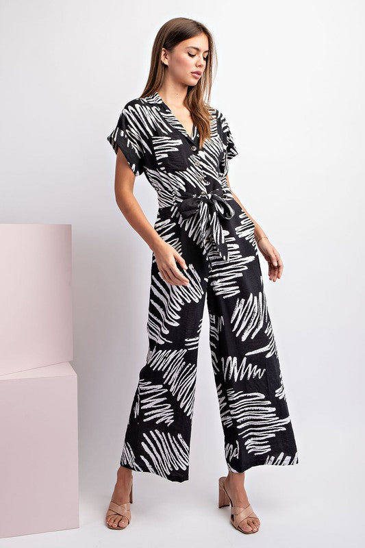 PRINTED JUMPSUIT WITH WAIST TIE