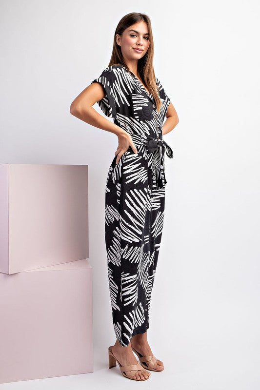 PRINTED JUMPSUIT WITH WAIST TIE