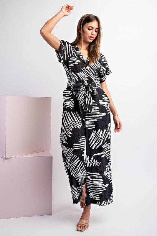 PRINTED JUMPSUIT WITH WAIST TIE