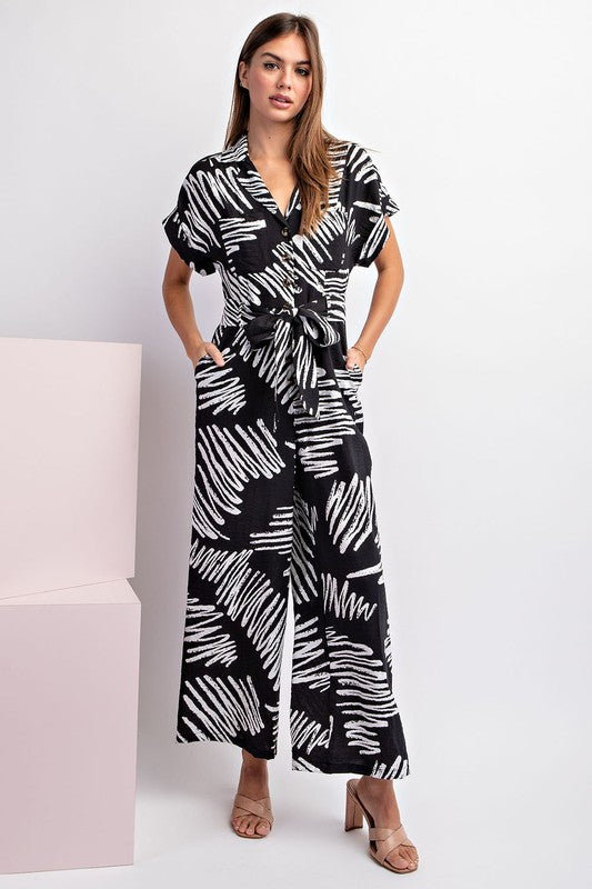 PRINTED JUMPSUIT WITH WAIST TIE