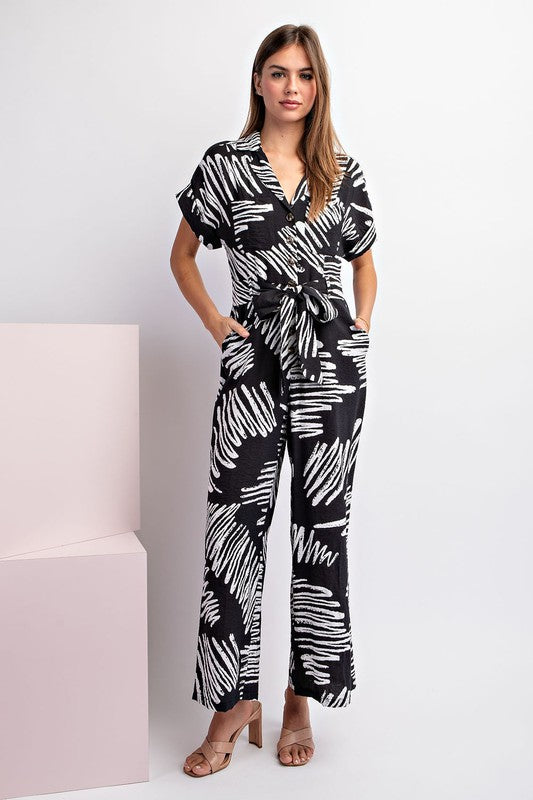 PRINTED JUMPSUIT WITH WAIST TIE