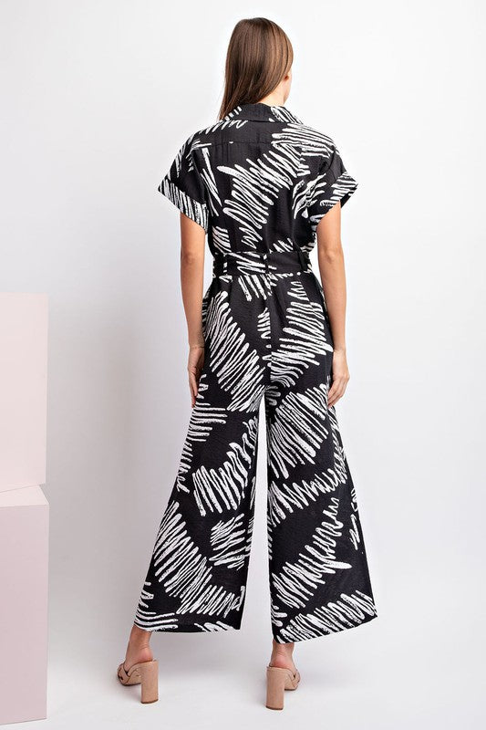 PRINTED JUMPSUIT WITH WAIST TIE