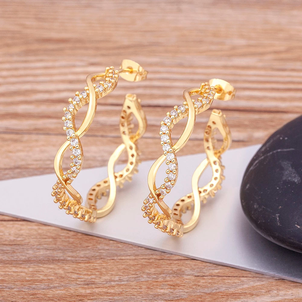 ZIRCON CRYSTAL TWIST HOOPS